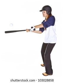 Woman baseball or Softball player hits a ball with a bat isolated on white.