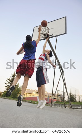 Similar – Image, Stock Photo Young female basketball player in an urban court