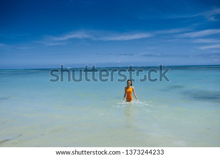 Woman bathes in the ocean nature vacation travel tropics