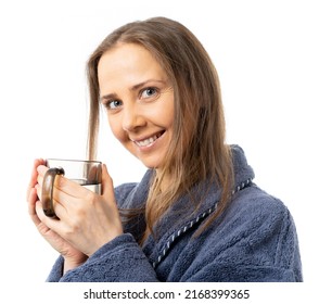 A Woman In A Bathrobe Holds A Mug Of Water. A Man Drinks A Lot Of Water. He Drank A Lot And Sat At Home. Close-up. Isolated.