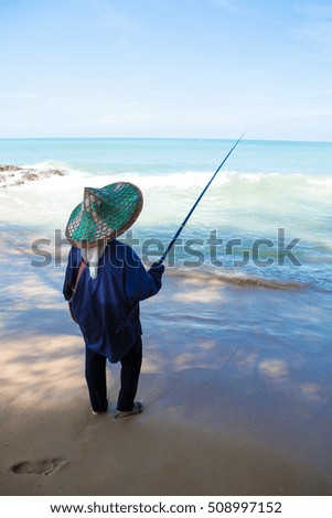 woman beach fishing