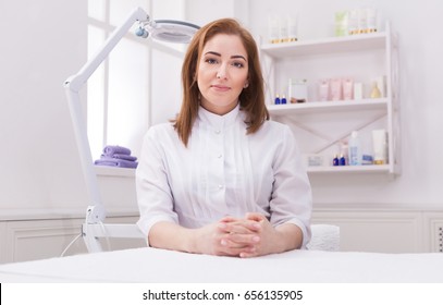Woman beautician doctor at work in spa center. Portrait of a young female professional cosmetologist. Healthcare occupation, medical career