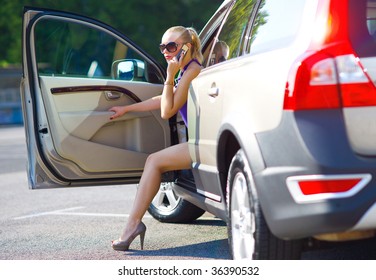 Woman With Beautiful Legs Exit The Car