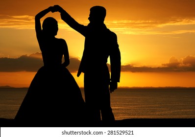 Woman in a beautiful wedding dress with groom