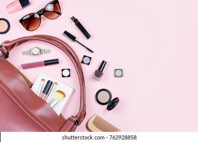 Woman Beauty Accessories And Make Up Products Flat Lay On A Pastel Pink Background. Copy Space