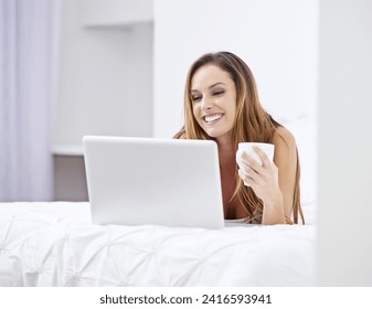Woman, bedroom and coffee on laptop for relax, search website and registration or streaming at home. Young person online on bed with computer for morning news, social media update or reading blog