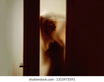 Erotic tits on blurred glass