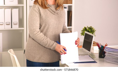 The Woman Behind The Desk In The Office