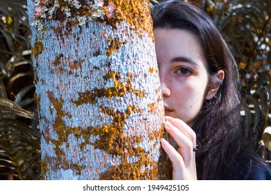 Woman Behind White Tree In Forest