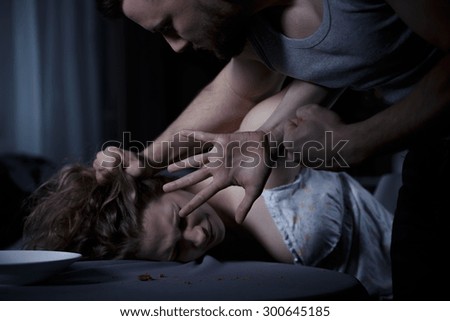 Similar – Image, Stock Photo Violence in an alcoholic family. Reflection of a violent man.