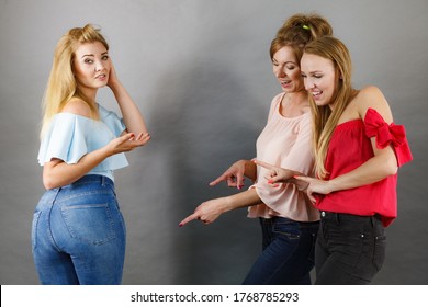 Woman Being Bullied By Two Female Friends Gossiping About Her Body Shape. Friendship Rivaly And Envy Problems.