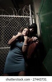 Woman Being Choked In A Dark Alley By A Thug