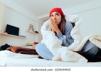 
Woman being Cold Rubbing her Hands at Home. Person saving money and electricity turning the head off
 - Powered by Shutterstock