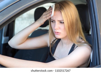 Woman Being Hot During A Heat Wave In Car 