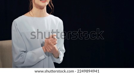 A woman being interviewed. documentary program.