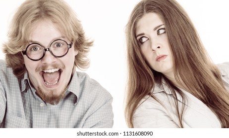 Woman Being Irritated Looking Displeased At Her Friend Or Boyfriend Being Silly, Fooling Around And Being Dumb. Couple Relatioships Problems.