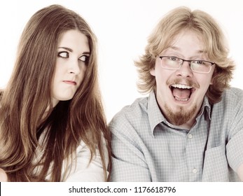 Woman Being Irritated Looking Displeased At Her Friend Or Boyfriend Being Silly, Fooling Around And Being Dumb. Couple Relatioships Problems.