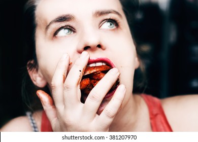 Woman Binge Eating French Fries, Mouth Full Of Food