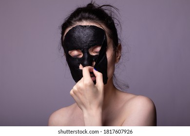 Woman In Black Cloth Mask On Face, Cosmetic Skin Care