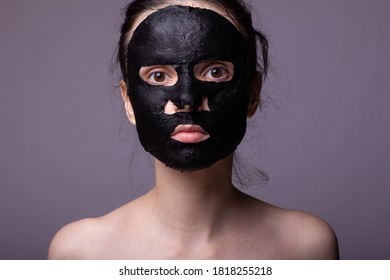 Woman In Black Cloth Mask On Face, Cosmetic Skin Care