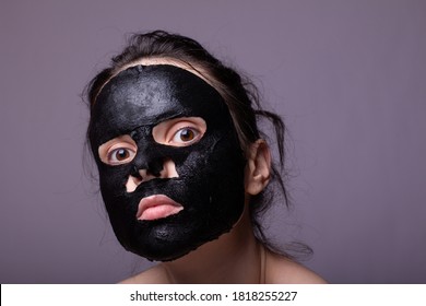 Woman In Black Cloth Mask On Face, Cosmetic Skin Care