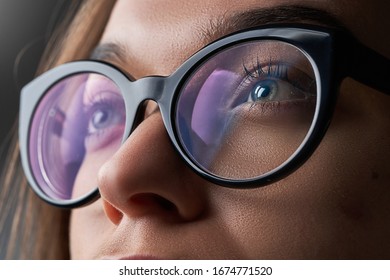 Woman in black frame glasses close up for vision correction       - Shutterstock ID 1674771520