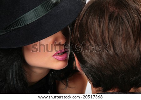 woman in black hat says man Stock photo © 