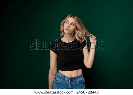 Woman in Black Top Poses for Picture