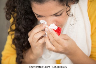 Woman Bleeding From Her Nose