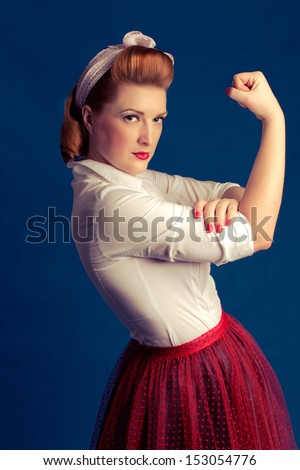 woman blond biceps show-off in retro style