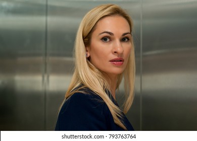 
Woman blond in the elevator
 - Powered by Shutterstock