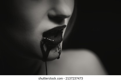 Woman With Bloody Mouth Close Up Photo