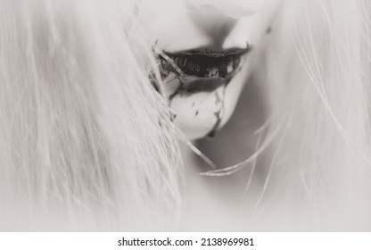 Woman With Bloody Mouth Close Up Photo