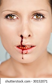 A Woman With A Bloody Nose.