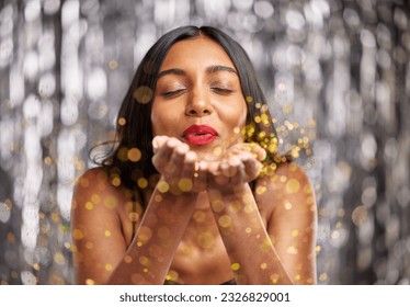 Woman, blow gold glitter and celebration with party and sparkle, bokeh with New Years and festive. Happiness, excited and female person, confetti and anniversary with aesthetic and special event - Powered by Shutterstock