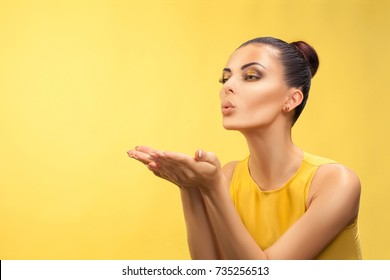 Woman Blowing A Kiss