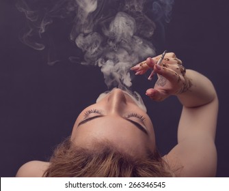 Wife smoking and blowing