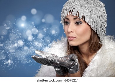 Woman Blowing Snow