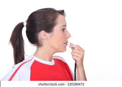 Woman Blowing A Whistle