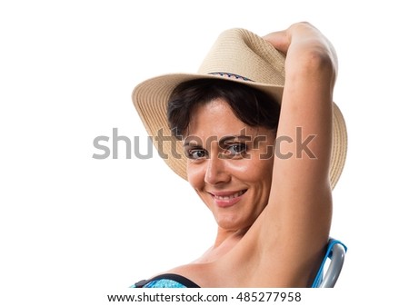 Woman in blue bikini sitting in a chair