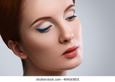 Woman With Blue Eyeliner On Her Eyes