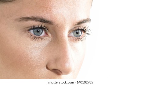 Woman Blue Eyes Close Up Looking Down With White Background