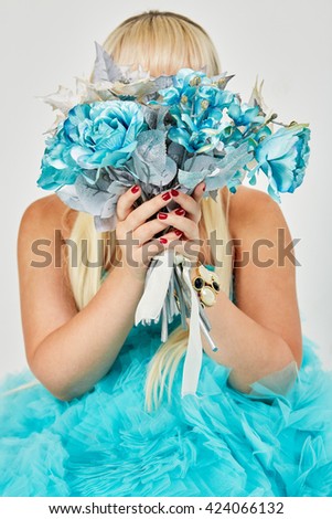 Similar – Happy blonde woman posing near a huge flower