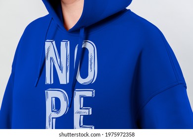 Woman in a blue hoodie mockup