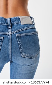 Woman In A Blue Jeans With A Tag Mockup