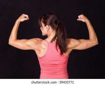 Similar Images, Stock Photos & Vectors of Strong fitness woman showing ...