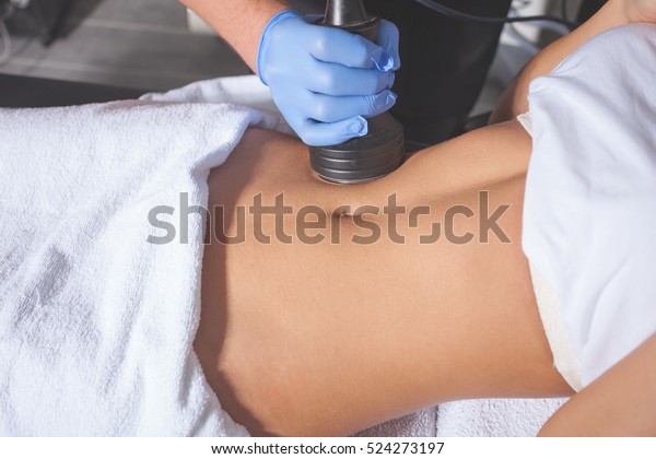 woman body treatment\
at medical spa center