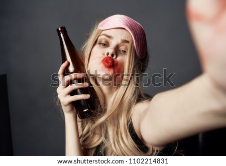  woman with bottle of beer weekend                              