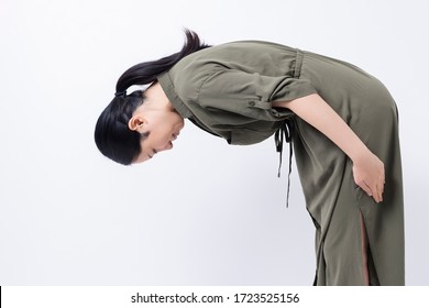 Woman Bowing Shot In The Studio