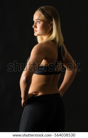Woman Boxer On A Black Background Sport Girl With Big Booty Looks Back Woman Boxer On A Black Background Sport Girl With Big Booty Looks Back